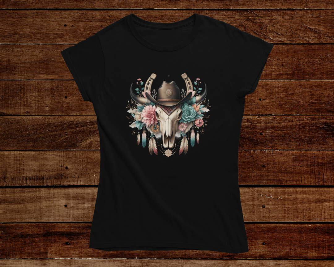 Black t-shirt with a bull skull design featuring flowers on a wooden background