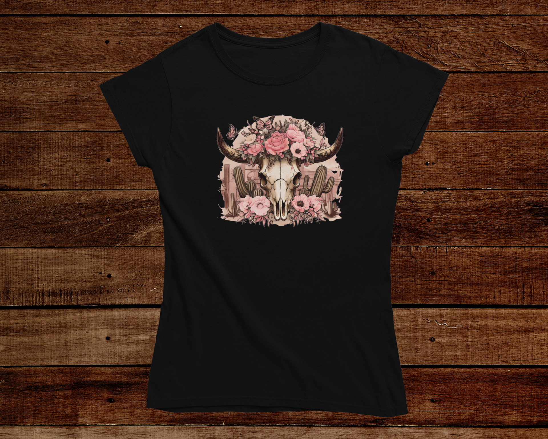 Black t-shirt with a bull skull and flowers design on a wooden background