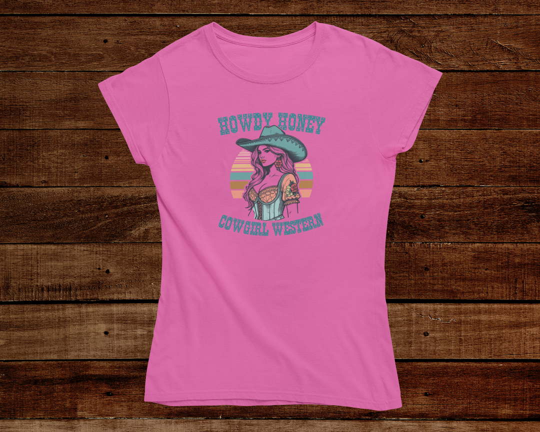 Pink t-shirt with a graphic design of a cowgirl on a wooden background