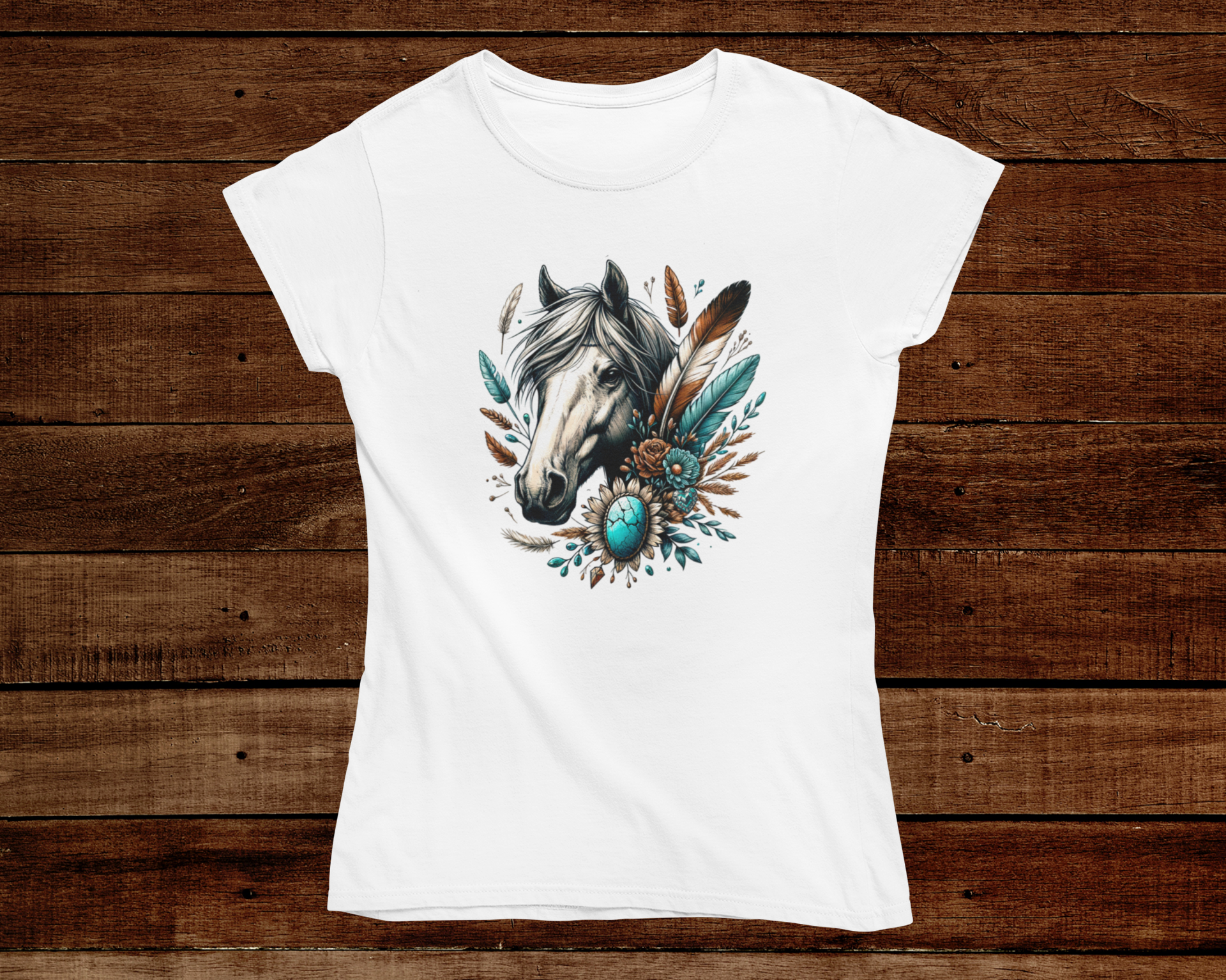 White t-shirt with a horse and feather design on a wooden background