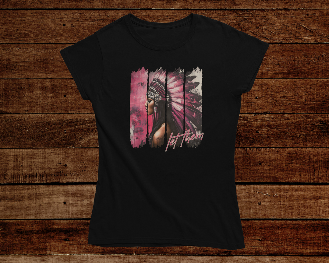 Black t-shirt with a colorful graphic design on a wooden background