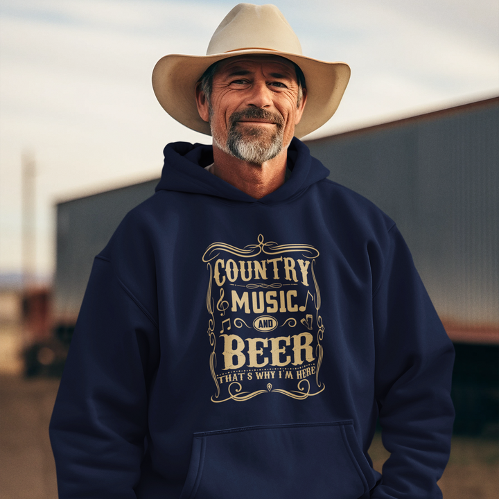 Man wearing a navy hoodie with 'Country Music & Beer' text, standing outdoors.
